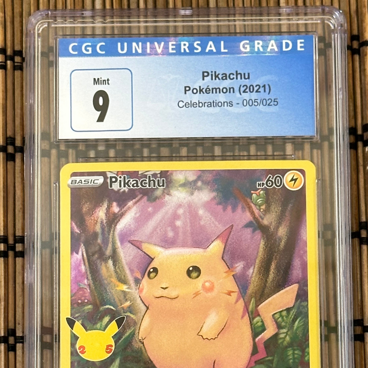 Pikachu 005/025 (CGC Universal Grade 9) GoldenFishGames Pikachu 005/025 (CGC Universal Grade 9) GoldenFishGames