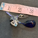 Glass Bead White Black Possum Charm