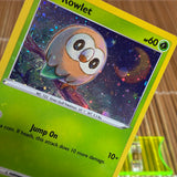 Rowlet (SWSH220) (Holo Swirl Cosmo Holo)